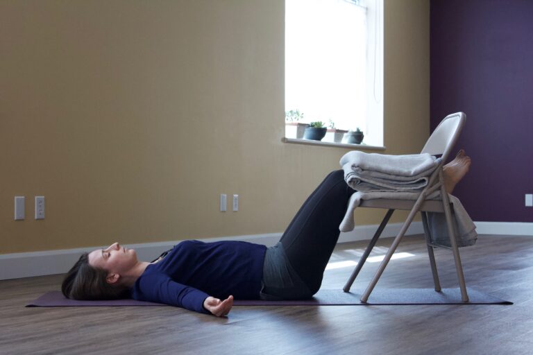 Picture legs up the chair yoga pose, a great one for nervous system regulation